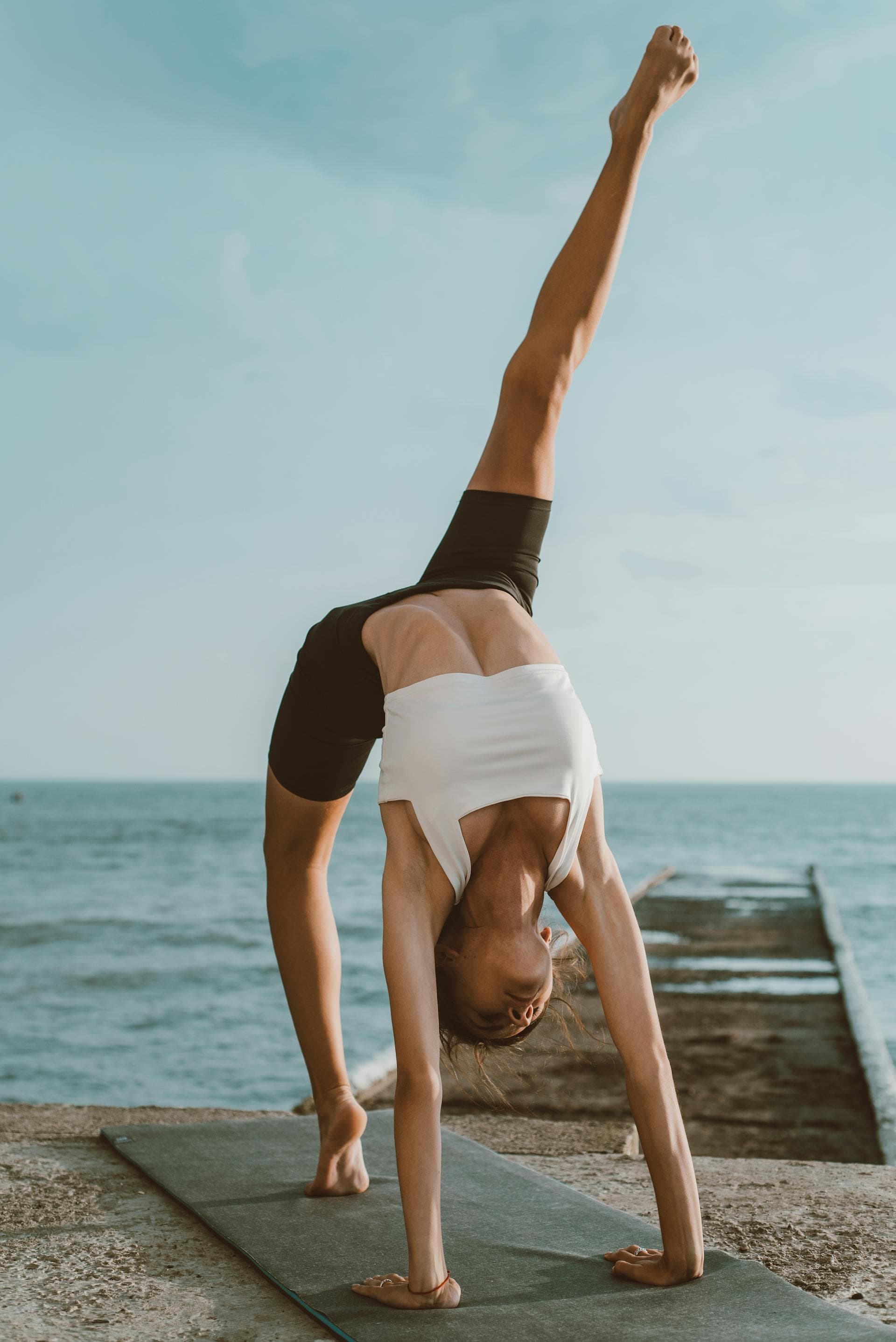 Person practicing yoga outdoors